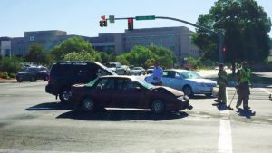 Two vehicles collided at the 700 South and River Road intersection when one of the drivers allegedly failed to obey the traffic signal, St. George, Utah, June 14, 2016 | Photo by Kimberly Scott, St. George News