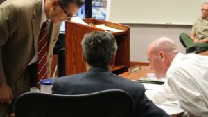 Iron County Attorney Scott Garrett and Defense Attorney Greg Skordas discuss evidence Tuesday during Grant Louis Biedermann's trial/ Biedermann is on trial for alleging firing a 40 caliber assault rifle on Sheriff deputies and injuring Deputy Kellen Hudson in 2013, Cedar City, Utah, June 14, 2016 | Photo taken by Mike Kohl, St. George/Cedar City News