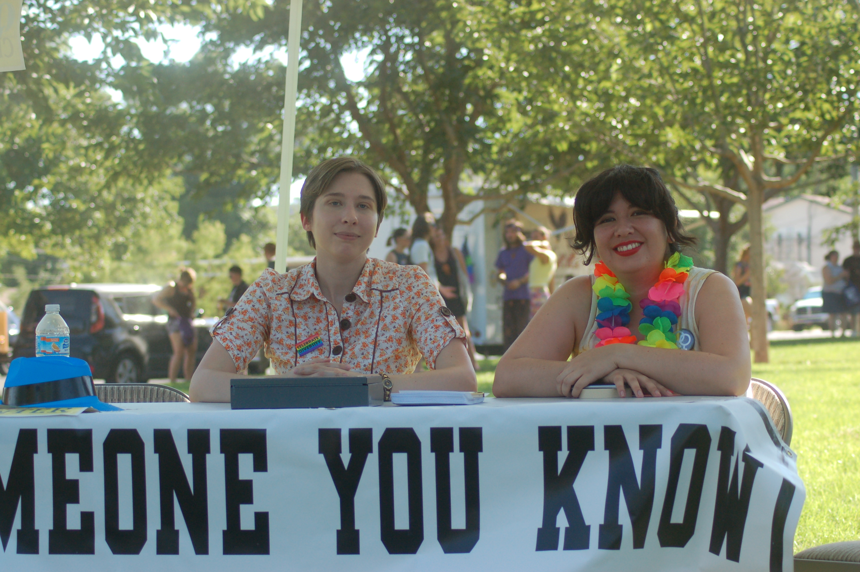 Barrett Beck and her wife Denise Nadal hand out information for the new LGBTQ Inclusion Center during the gay pride celebration held at Vernon Worthen Park, St. George, Utah, June 25, 2016 | Photo by Hollie Reina, St. George News