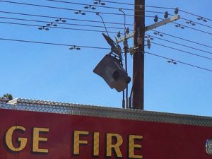 A powerful gust of wind lifted a 40-pound 96-gallon garbage can and hurled it some 30 feet in the air where it became stuck in the overhead power lines, St. George, Utah, June 13, 2016 | Photo by Kimberly Scott, St. George News