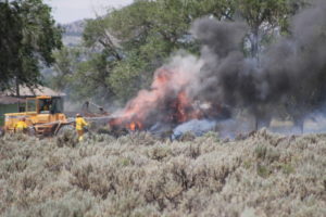 Fire crews worked to put out two fires Friday, together totaling approximately eight acres in the Cedar City area, June 10, 2016 | Photo by Tracie Sullivan, St. George/Cedar City News