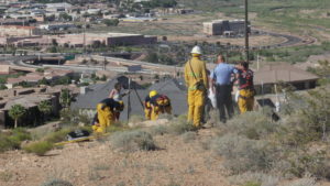A woman who fell off a cliff above the Bloomington Wal-Mart was rescued by a team from the St. George Fire Department, St. George, Utah, June 2, 2016 | Photo by Don Gilman, St. George News
