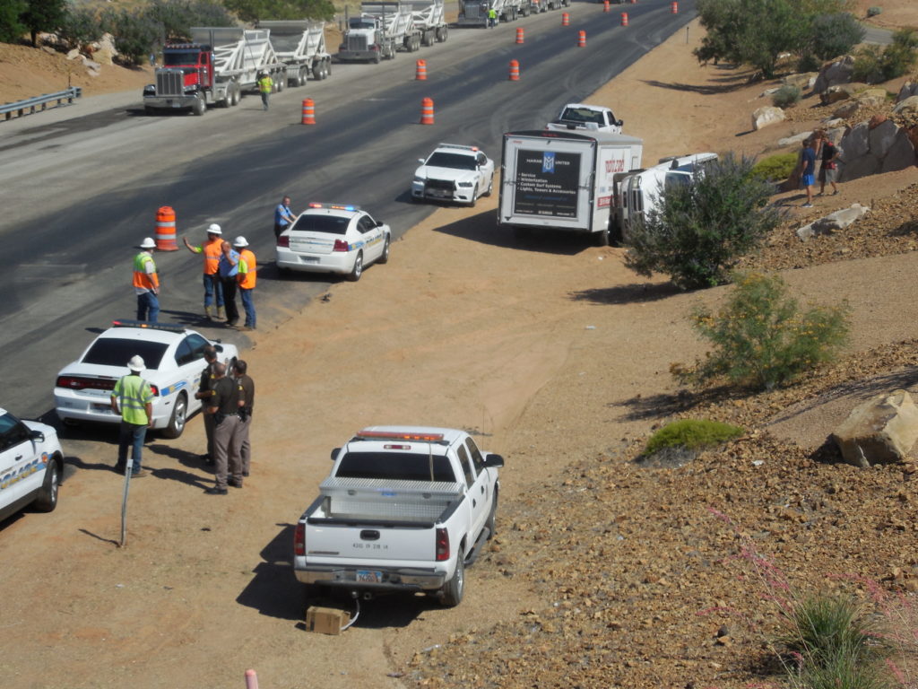 A truck pulling a trailer rolls on S.R. 18 Wednesday morning, June 29, 2016 | Photo by Julie Applegate, St. George News