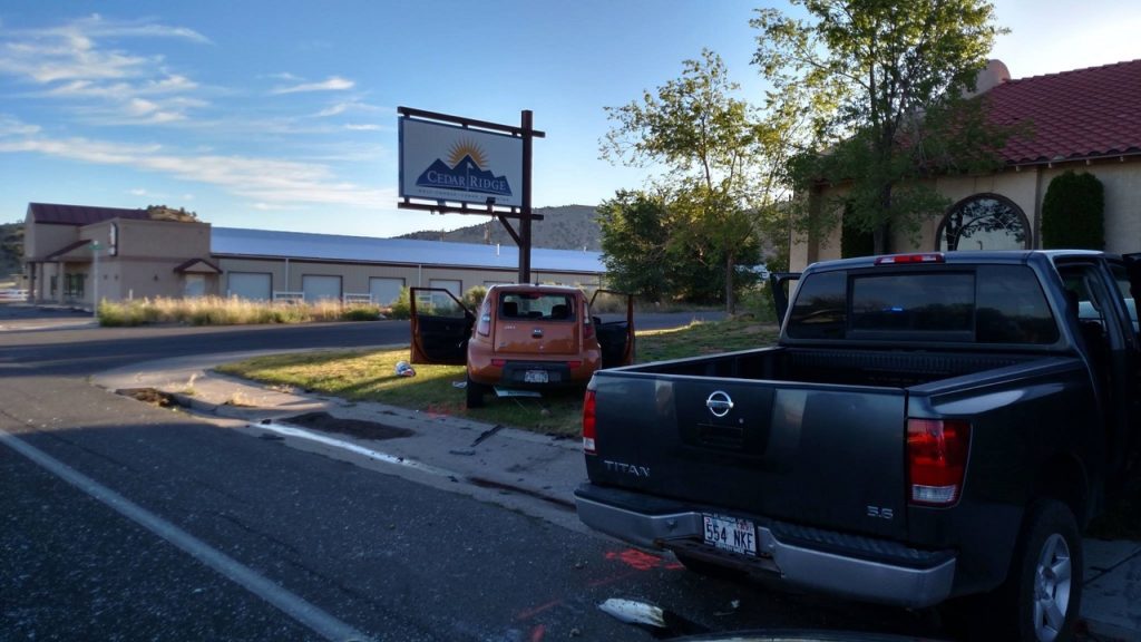Gray Nissan Titan pickup truck and gold Kia Soul involved in fatal accident early Saturday morning, Cedar City, Utah, June 18, 2016 |Photo courtesy of Cedar City Police Department, St. George News