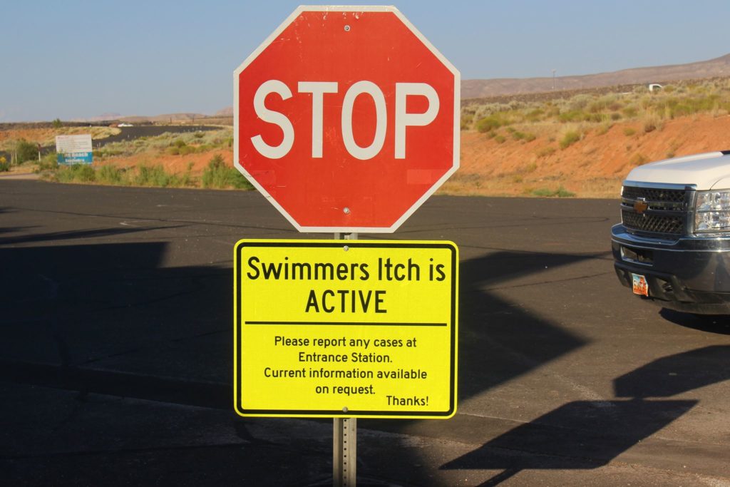 A sign at the entrance to Sand Hollow State Park warns visitors that swimmer's itch is active, Hurricane, Utah, June 23, 2016 | Photo by Cody Blowers, St. George News