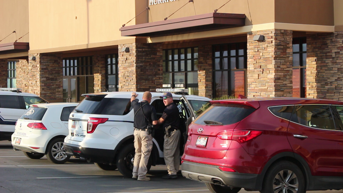 Hurricane City Police officers investigate the report of an armed robbery at the Hurricane Family Pharmacy, Hurricane, Utah, June 21, 2016 | Photo by Mori Kessler, St. George News