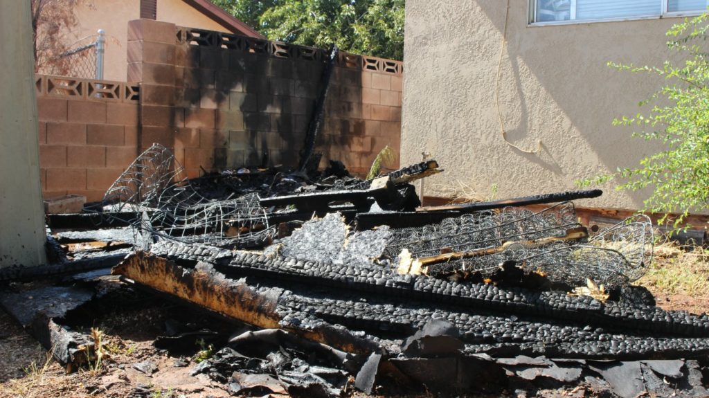 Firefighters were called to a shed fire that threatened a home in the Dixie Downs area. The shed was a total loss with the home receiving minor external damage, St. George, Utah, June 7, 2016 | Photo by Mori Kessler, St. George News