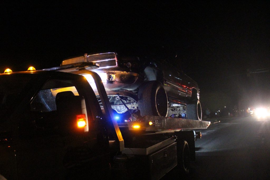 Tan Dodge pickup truck being towed after two-vehicle collision on East Telegraph Street and North 300 East Thursday night, Washington, Utah, June 23, 2016 | Photo by Cody Blowers, St. George News