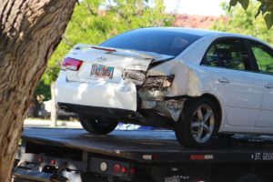 White Hyundai Sonata being towed after collision on 100 South at the intersection of Main Street in St. George, Utah, July 8, 2016 | Photo by Cody Blowers, St. George News