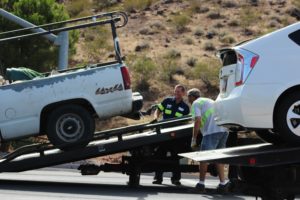 Both veicles loaded on tow trucks aftercollision on Bluff Street and 100 South, St. George, Utah, July 16, 2016 | Photo by Cody Blowers, St. George News