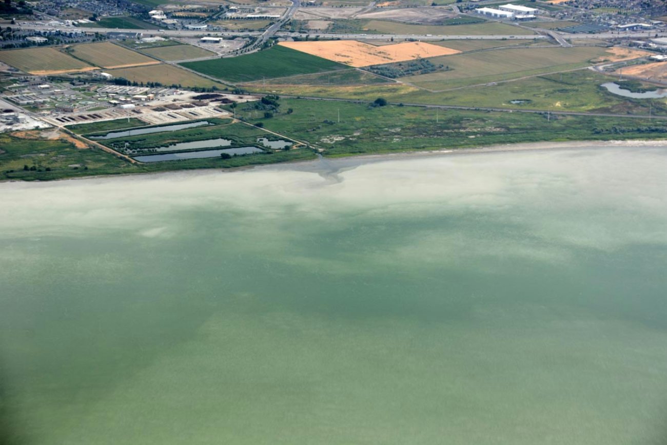 A toxic algae bloom has covered much of Utah Lake and has resulted in its being closed to the public since July 14. Over 100 people have been sickened due to exposure to the bloom according to The Associated Press, Utah County, Utah, July 2016 | Photo courtesy of the Utah Department of Environmental Quality, St. George News