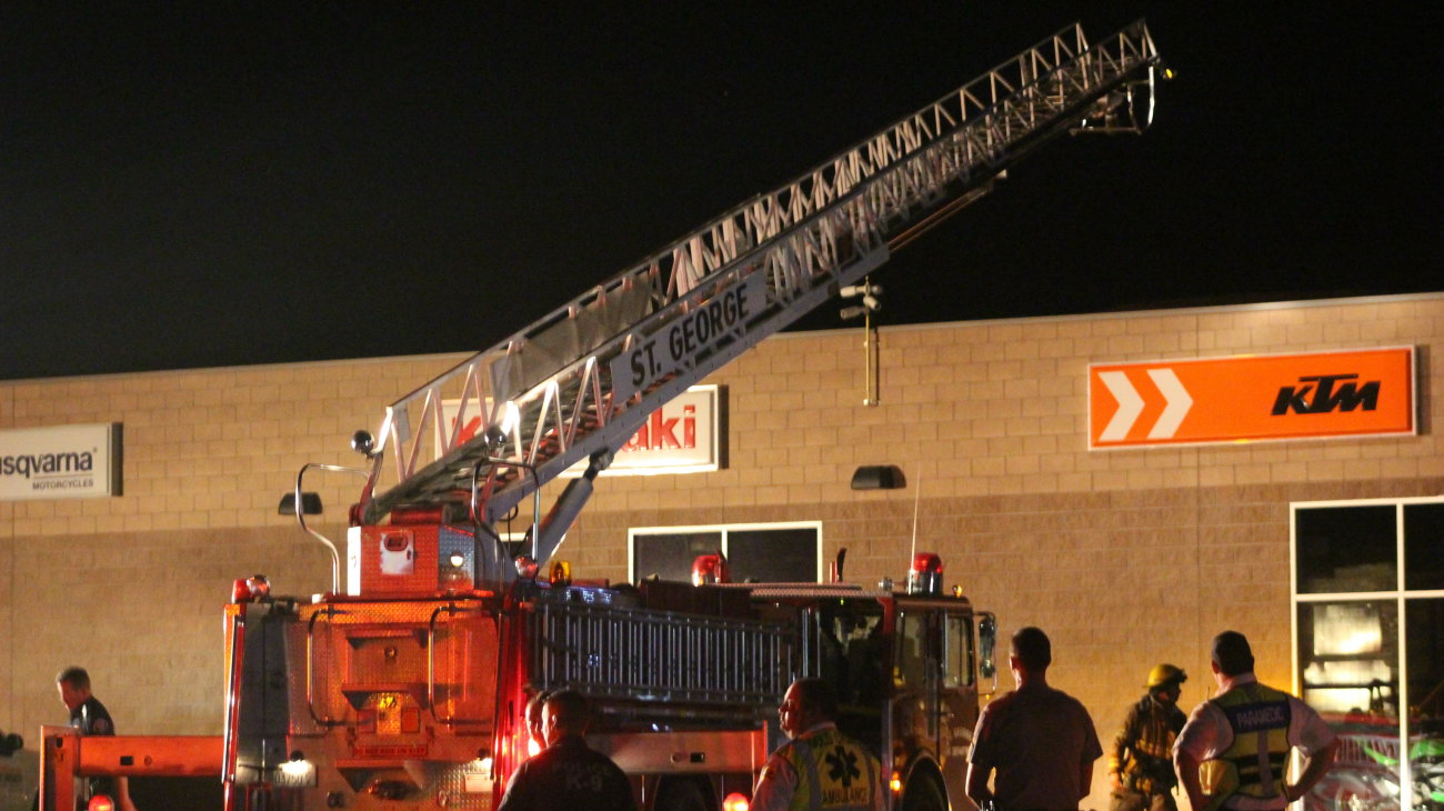 Firefighters with the Washington City and St. George Fire Departments responded to a fireworks-caused fire on a business rooftop on Buena Vista Boulevard, Washington City, Utah, 4 July, 2016 | Photo by Mori Kessler, St. George News