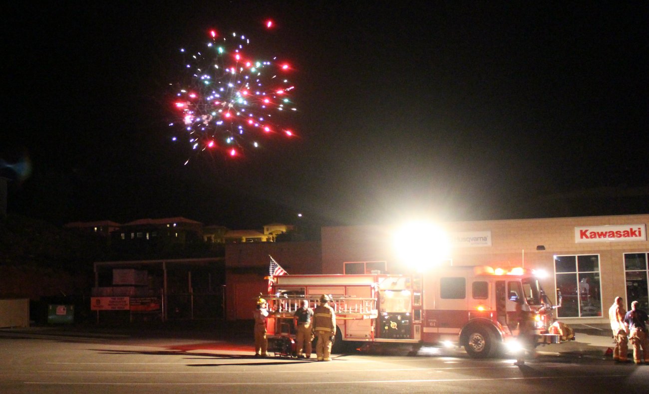 Firefighters with the Washington City and St. George Fire Departments responded to a fireworks-caused fire on a business rooftop on Buena Vista Boulevard, Washington City, Utah, 4 July, 2016 | Photo by Mori Kessler, St. George News