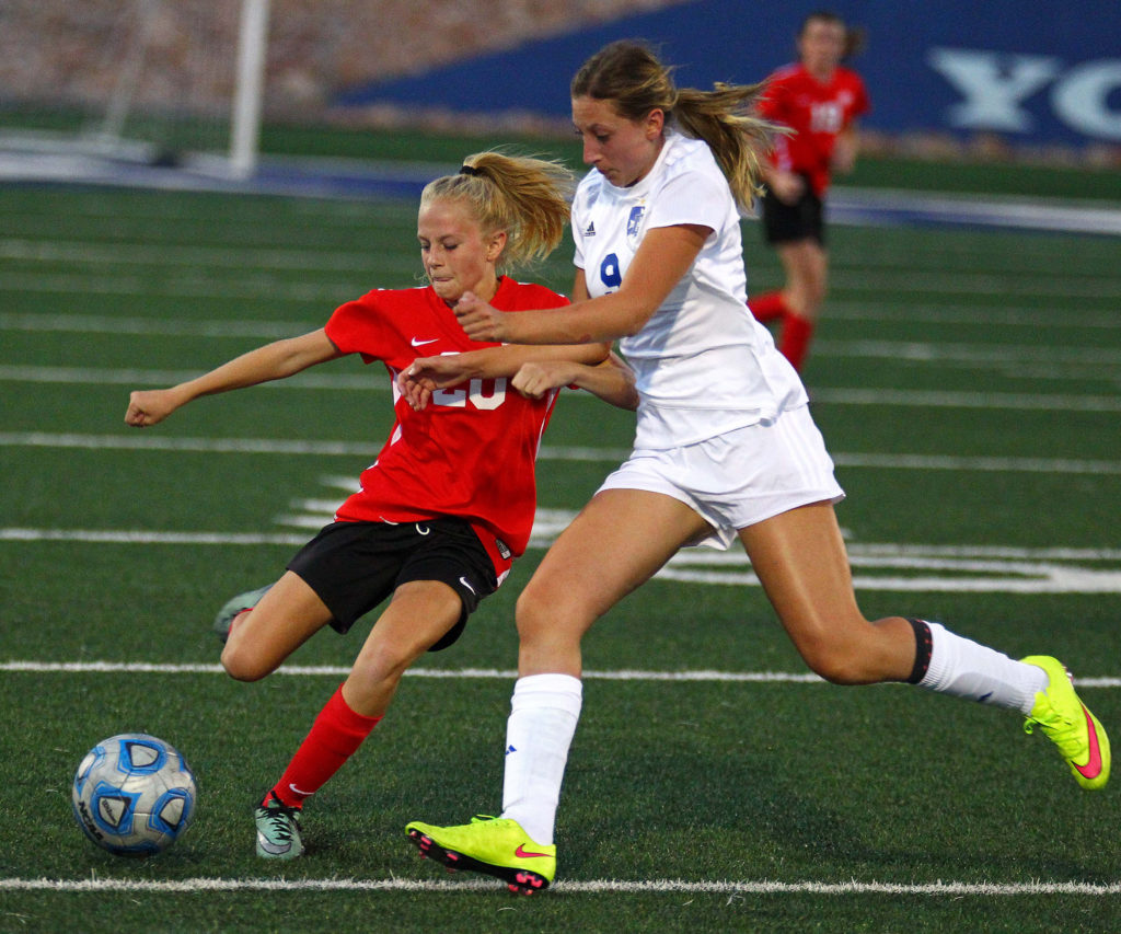 Hurricane's Madelyn Hatch (20) and Dixie's Kourtney Kezos (9), Dixie vs. Hurricane, Soccer, St. George, Utah, Aug. 31, 2016, | Photo by Robert Hoppie, ASPpix.com, St. George News