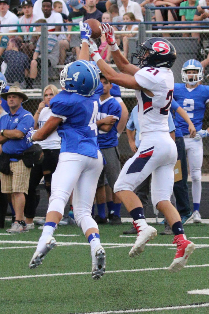 Dixie's Tyson Miller (4), And Springvill"s Brennen Rymer (21), Dixie vs. Springville, Football, St. George, Utah, Aug 19, 2016, | Photo by Kevin Luthy, St. George News