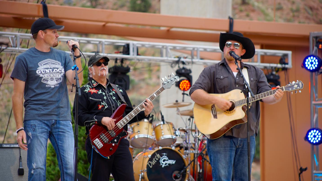 Eric Dodge joins Gunlock County on the O.C. Tanner Amphitheater stage, Springdale, Utah, summer, 2016 | Photo courtesy of Emceesquare Media Inc., St. George News