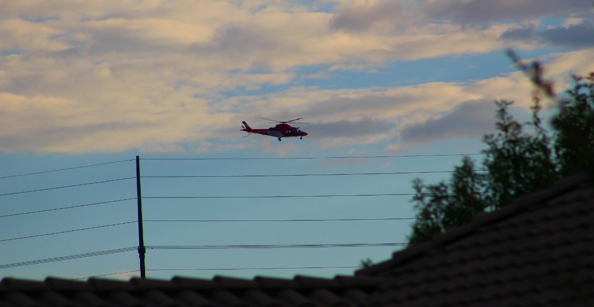 Life Flight circles the area where a hiker was pinned between rocks. The helicopter was not needed and was later released back into service, St. George, Utah, Aug. 31, 2016 | Photo by Cody Blowers, St. George News 