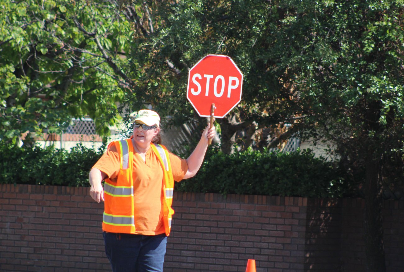 Long-time crossing guard Jathy Bruhm at the intersection of 700 South and 600 East in St. George, Utah, Aug. 23, 2016 | Photo by Mori Kessler, St. George News