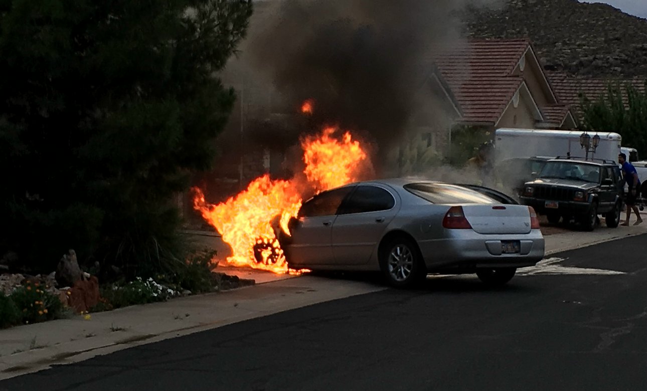 A 2003 Chrysler 300M on Grouse Drive in Hurricane was partially consumed by fire. Though the car was a loss, no one was hurt as a result of the fire, Hurricane, Utah, Aug. 22, 2016 | Photo courtesy of Tanner Bo, St. George News 