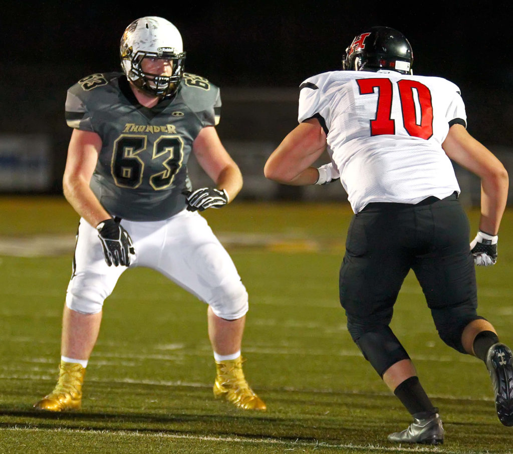 Desert Hills’ Houston Stapley (63) and Hurricane's Tyler Mitchell (70), Desert Hills vs. Hurricane, Football, St. George, Utah, Sept. 23, 2016, | Photo by Robert Hoppie, ASPpix.com, St. George News