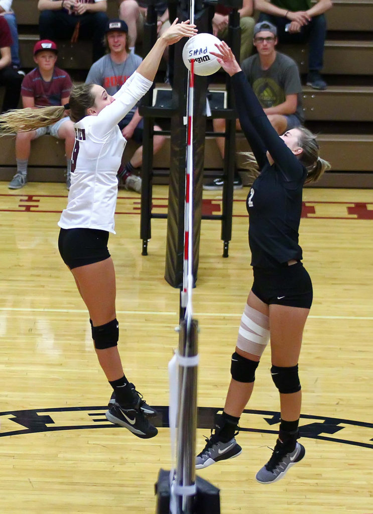 Pine View's Amelia Goebel (19) and Desert Hills' Hailee Harmer (2), Pine View vs. Desert Hills, Volleyball, St. George, Utah, Sept. 27, 2016, | Photo by Robert Hoppie, ASPpix.com, St. George News