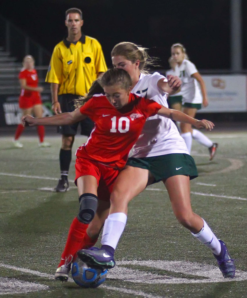 Hurricane's Mylee Moon (10) and Snow Canyon's Ashley Brindley (17), Hurricane vs. Snow Canyon, Soccer, St. George, Utah, Sept. 27, 2016, | Photo by Robert Hoppie, ASPpix.com, St. George News