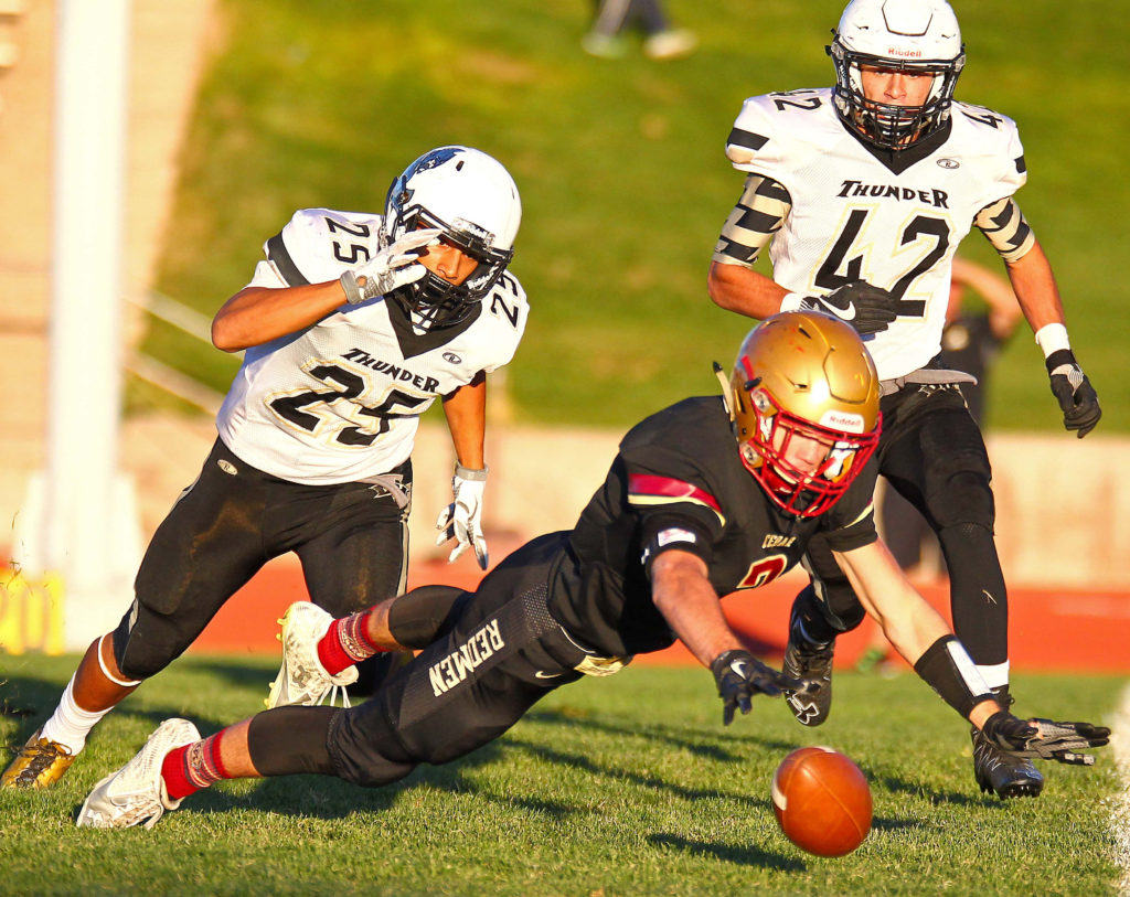 Cedar's Braden Garrett (3) dives for a fumble, Cedar vs. Desert Hills, Football, Cedar City, Utah, Sept. 16, 2016, | Photo by Robert Hoppie, ASPpix.com, St. George News