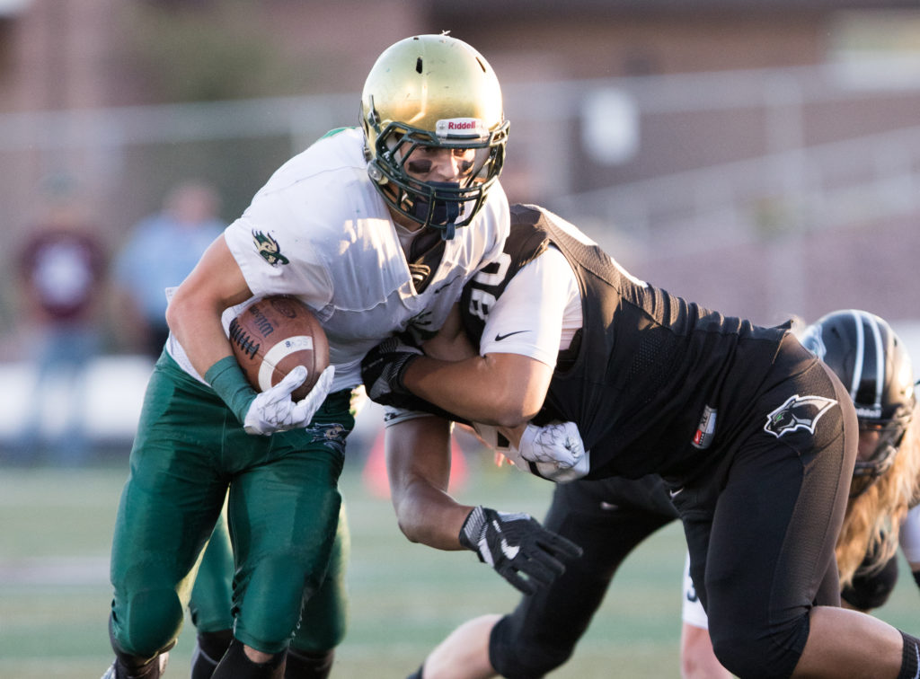 Snow Canyon's Chris Poulsen (6) and Pine View's Brooks Maile (90), Pine View vs. Snow Canyon, Football, St. George, Utah, Sept. 23, 2016, | Photo by Todd Ellis, St. George News