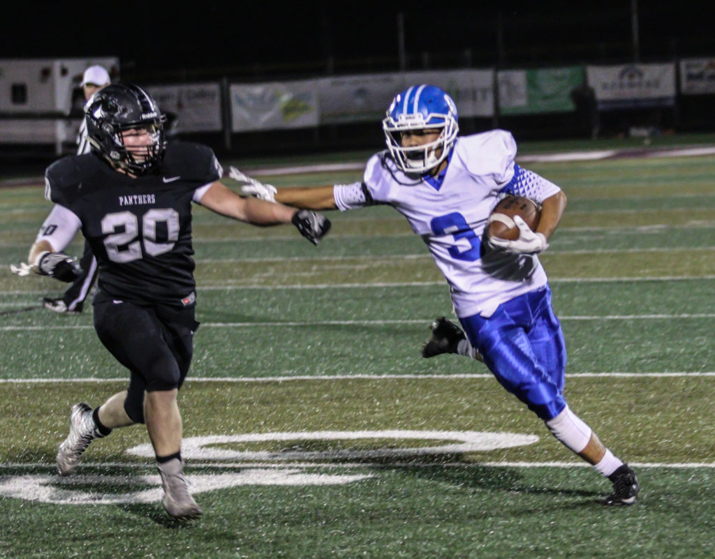 Dixie's Nate Mahi (3), and Pine View's Austin Peterson (20), Pine View vs. Dixie, Football, St. George, Utah, Sep.16, 2016, | Photo by Kevin Luthy, St. George News