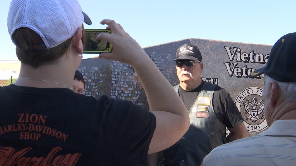 A veteran poses in front of the Vietnam Veterans monument following the Vietnam Veterans Monument dedicatory ceremony at Zion Harley Davidson, Washington City, Utah, September 10, 2016 | Photo by Sheldon Demke, St. George News