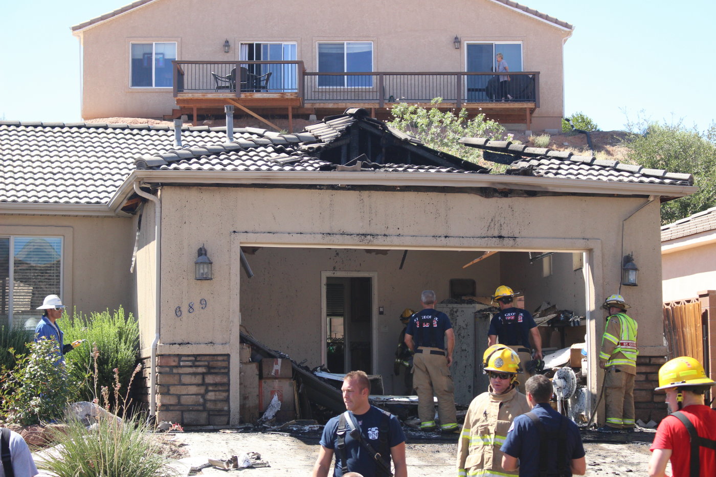 A St. George firefighter was injured when a garage door came down on him during a house fire on Lave Point Drive in St George, Utah, Sept. 19,2016 | Photo by Mori Kessler, St. George