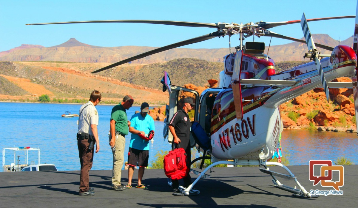Classic Air Medical helicopter and emergency flight personnel,with park rangers and rescuers at Sand Hollow State Park's main dock at the reservoir Saturday. Hurricane, Utah, Sept. 17, 2016 | Photo by Cody Blowers, St. George News