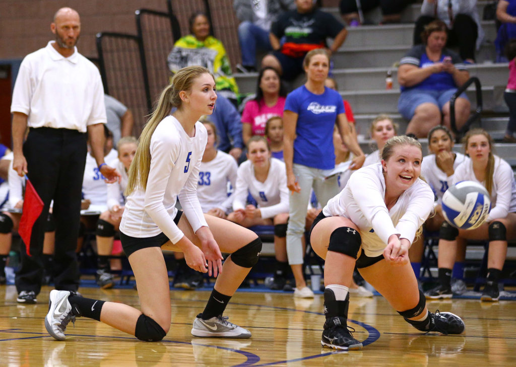 Dixie's Aspen Blair (10) and Tyler Stilson (5), Dixie vs. Desert Hills, Volleyball, St. George, Utah, Oct. 4, 2016, | Photo by Robert Hoppie, ASPpix.com, St. George News