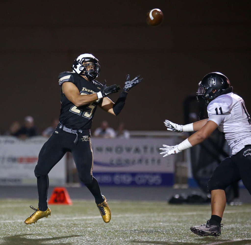 Desert Hills’ Marco Jordan (25) makes a catch, Desert Hills vs. Pine View, Football, St. George, Utah, Oct. 7, 2016, | Photo by Robert Hoppie, ASPpix.com, St. George News