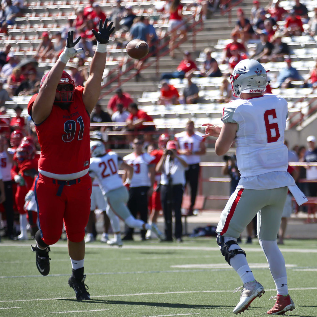 Dixie State's James Lautogia (91), Dixie State University vs. Western State Colorado University, Football , St. George, Utah, Oct. 1, 2016, | Photo by Robert Hoppie, ASPpix.com, St. George News