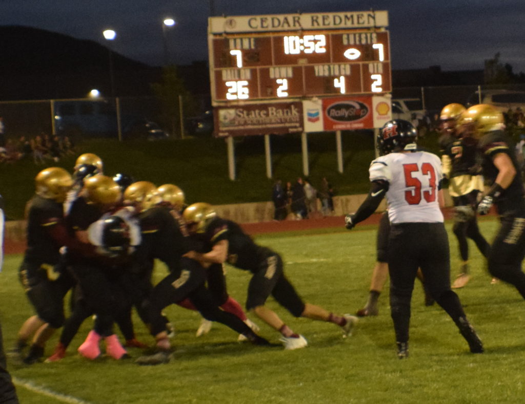 Joe Armijo makes some tough yards in the first half, Hurricane vs. Cedar, Cedar City, Utah, Oct. 7, 2016 | Photo by Katina Young, for St. George News