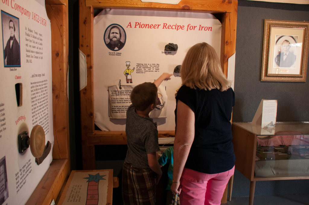 Visitors observe the recipe for making iron, Frontier Homestead State Park Museum, Cedar City, Utah, August 2016 | Photo by Kathy Lillywhite, St. George News