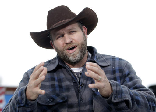 FILE - In this Jan. 5, 2016, file photo, Ammon Bundy speaks during an interview at Malheur National Wildlife Refuge, near Burns, Ore. Bundy the leader of an armed takeover of a national wildlife refuge took the witness stand in his own defense, tearfully telling jurors he was initially reluctant get involved in the plight of an Oregon ranching family, Tuesday, Oct. 4, 2016. (AP Photo/Rick Bowmer, File)