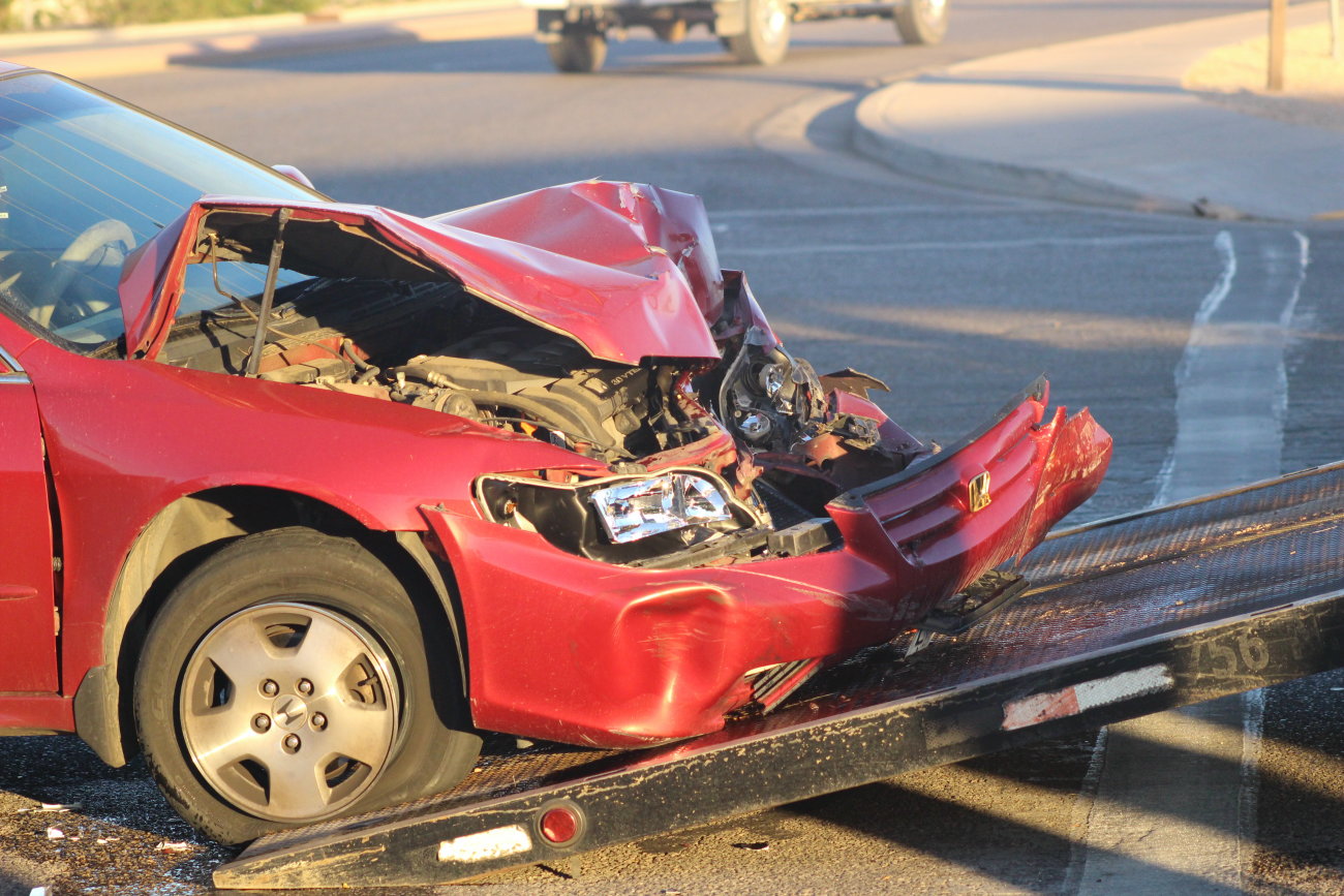 A passenger car and pickup truck towing a trailer collided at the intersection of Sunland Drive and Riverside Drive following a left-turn that did not account for oncoming traffic, St. George, Utah, Oct. 17, 2016 | Photo by Mori Kessler, St. George News