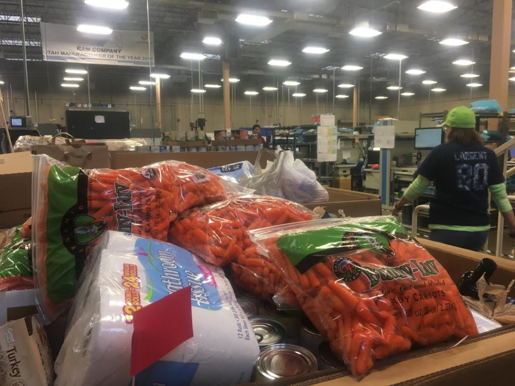 Thousands of pounds of donated food goods fill boxes at the RAM Company for their second annual employee food drive, St. George, Utah, Nov. 20, 2016 | Photo by Hollie Reina, St. George News