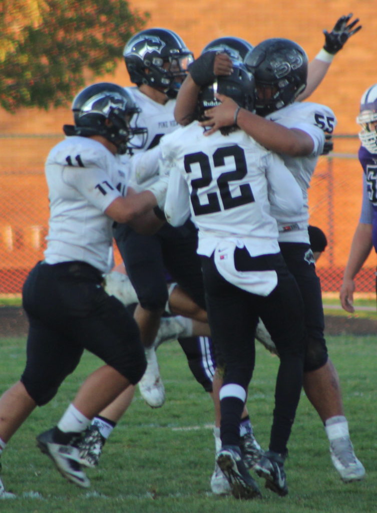 D'angelo Mpungi (22) celebrates with teammates after an interception, Pine View at Tooele, Tooele, Utah, Nov. 4, 2016 | Photo by AJ Griffin, St. George News