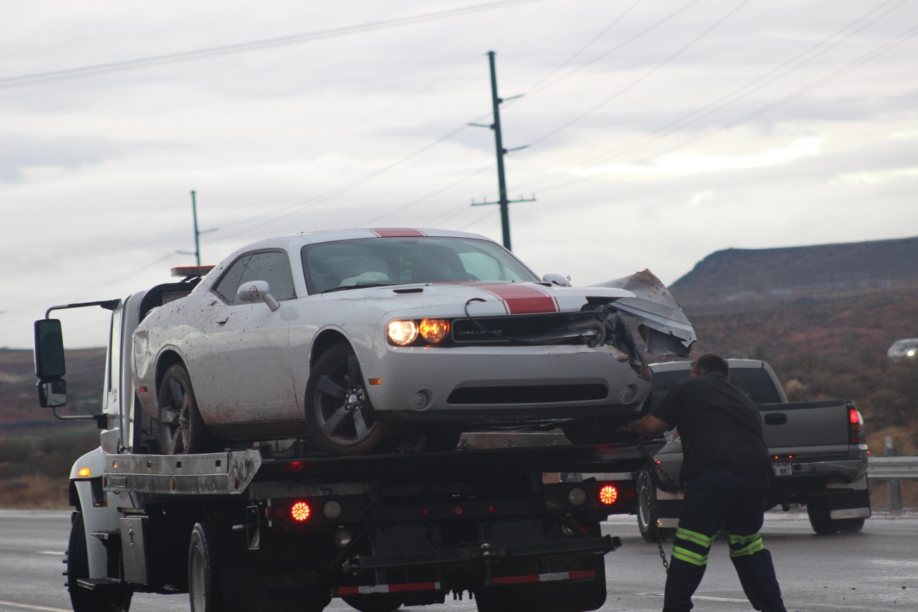 Slick road conditions, speed and bald tires are considered factors in the morning crash involving the Dodge Challenger, UHP Sgt. Jake Hick, said, Washington, Utah, Nov. 21, 2016 | Photo by Mori Kessler, St. George News