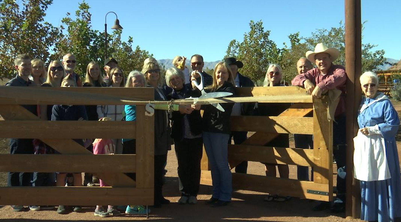 City officials and members of the Seegmiller family about to cut the ribbon signifying the completion and official opening of the Hela Seegmiller Historic Farm in Little Valley, St. George, Utah, Nov. 18, 2016 | Photo by Sheldon Demke, St. George News