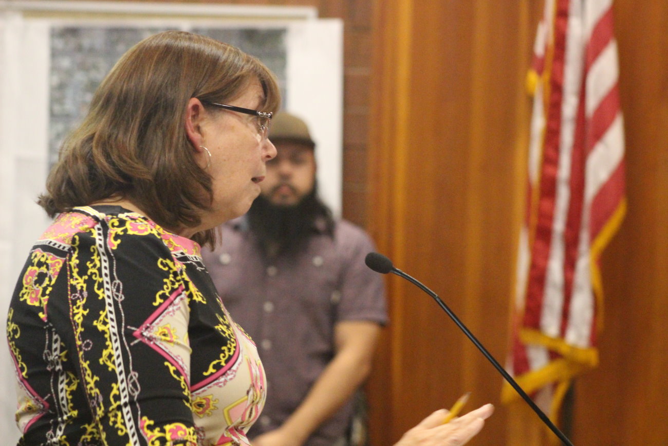 Riverstone resident Judy Harlin speaks to the City Council about concerns that the aesthetics of the southern entry into St. George via I-15 may be ruined by potentially allowing auto sales in the area around the Exit 2/Atkinville interchange, St. George, Utah, Oct. 3, 2016 | Photo by Mori Kessler, St. George News