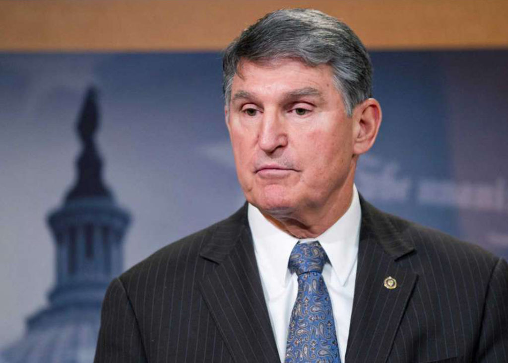 File photo: Sen. Joe Manchin, D-West Virginia, speaks during a news conference on Capitol Hill in Washington. Coal-state Democrats waged a fight for health benefits for thousands of retired miners, Washington D.C., Feb. 11, 2016 | Associated Press photo by Alex Brandon, St. George News 