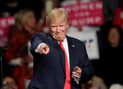 File photo: Donald Trump, the then Republican presidential candidate in file photo, acknowledges the crowd before speaking at Macomb Community College, Warren, Michigan, Oct. 31, 2016 | (AP Photo by Carlos Osorio, File, St. George News 