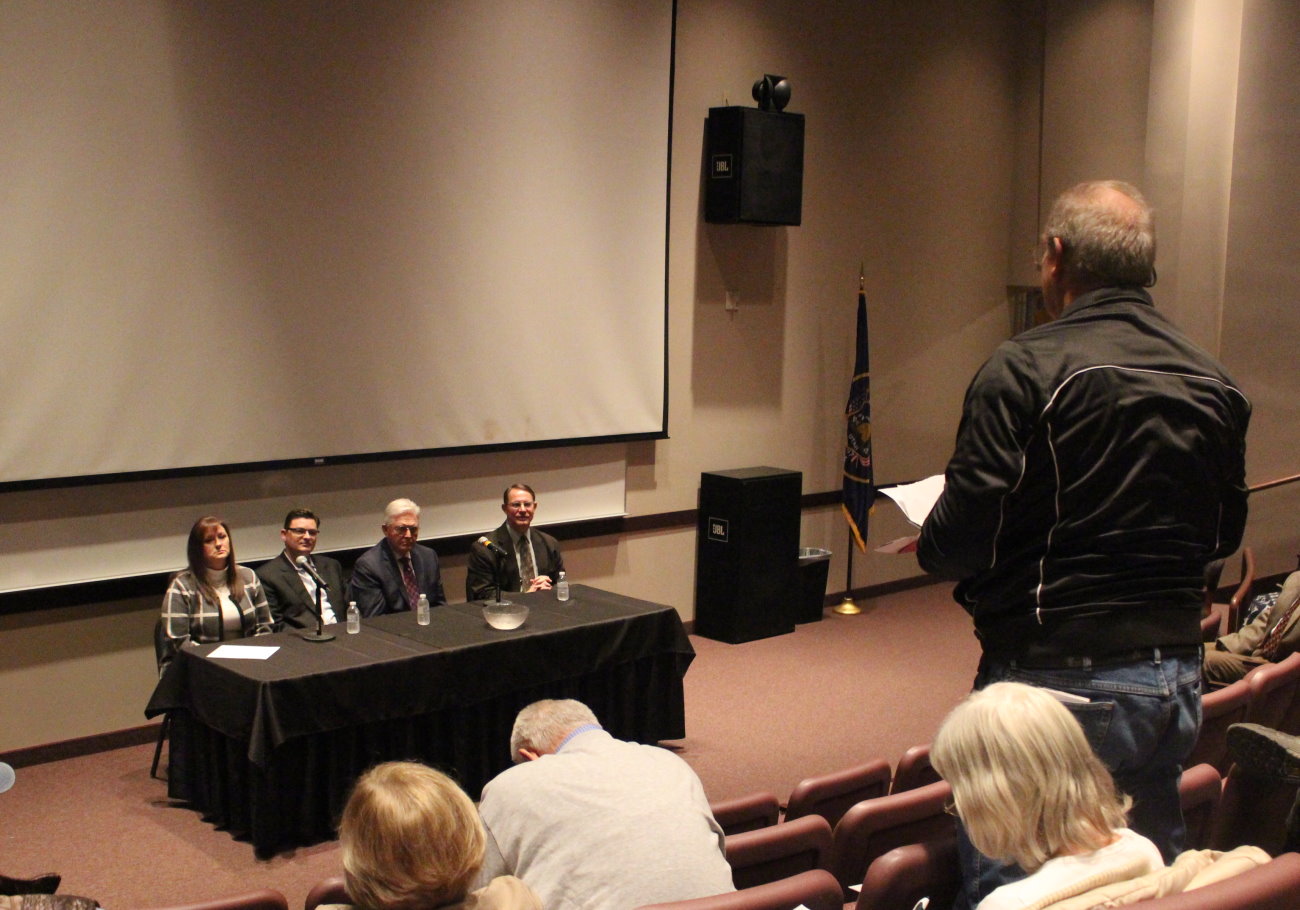 An attendee at a meeting discussing a proposed convention of states to amend the constitution ask questions of (L-R) Reps. Kim Coleman, Jon Stanard, V. Lowry Snow and Ken Ivory, St. George, Utah, Jan. 9, 2016 | Photo by Mori Kessler, St. George News