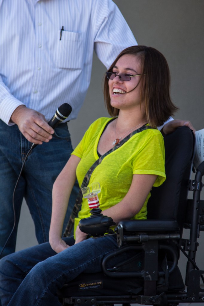 Lindsey Smith, more tears than words, at ribbon-cutting ceremony for her new home