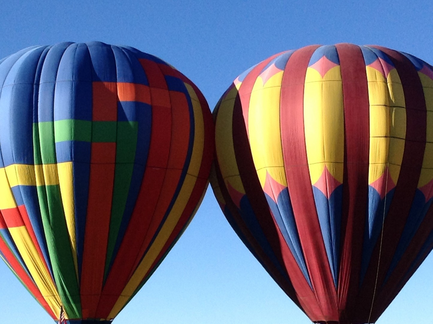 Colorful balloons are launched from a field during the 15th annual Panguitc...