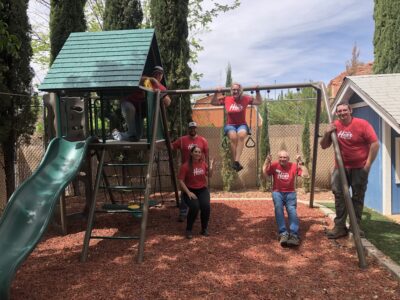 Chad Nyborg, Kesha Elliott, Travis Hunt and Marianne Eardley, Members of Ken Garff St. George Ford, celebrate the completion of the new jungle gym, Location and date unspecified | Photo courtesy of Austin Szatlocky, St. George News